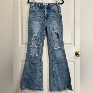 Risen Distressed Flare Jeans